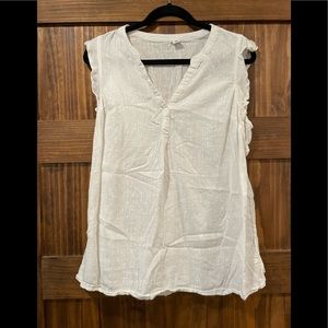 White sleeveless maternity blouse